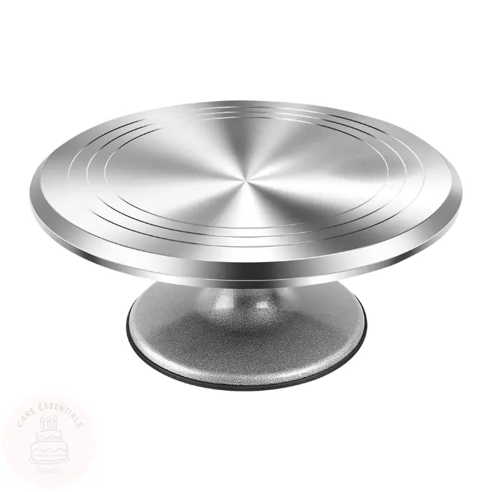 A 12-inch grey aluminum alloy revolving cake stand with a heavy-duty rotating turntable and a non-slip base, perfect for precision cake decorating.